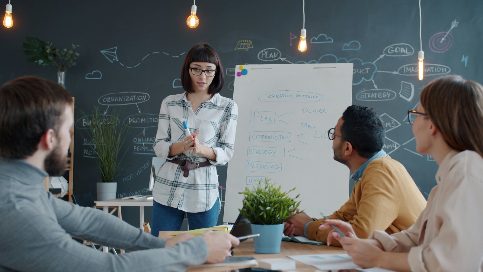 Facilitator leading an AI governance planning session at a whiteboard
